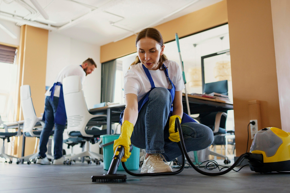 professional-cleaning-service-person-using-vacuum-cleaner-office1